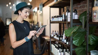 woman on ipad in spa