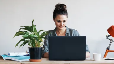 woman working on a computer