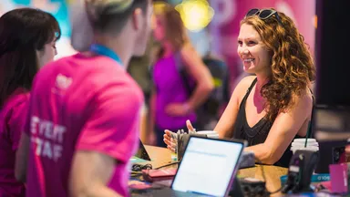 Woman checks into conference