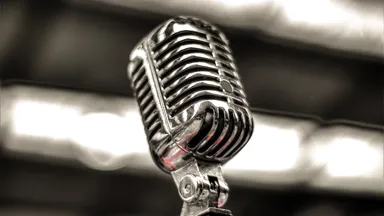 A microphone in front of lights