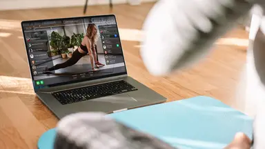 Fitness video on laptop