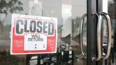 business door with closed sign