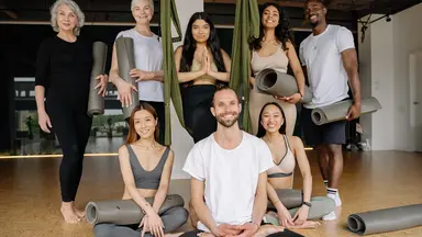 group of people in yoga studio
