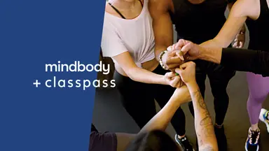 Mindbody + ClassPass with hands in a circle