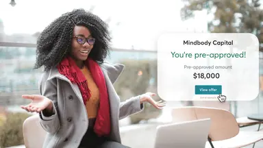 Woman is pre-approved for Mindbody Capital