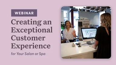 Woman managing front desk while saying bye to customer