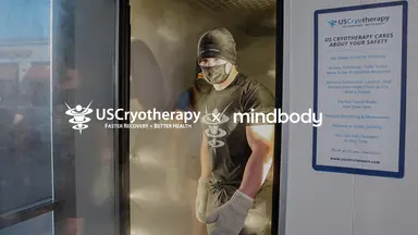 male employee at Cryotherapy with mask and gloves on 