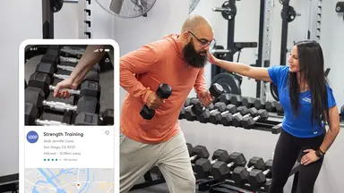 man working out with a trainer