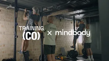 People training at the gym.