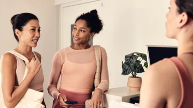 Two clients at the front desk