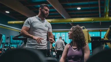 A personal trainer and his client