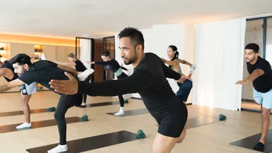 People taking a yoga class.
