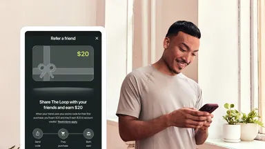 An image of a man on his phone and a graphic of the refer a friend feature 