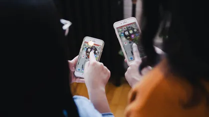 two women on their smartphone