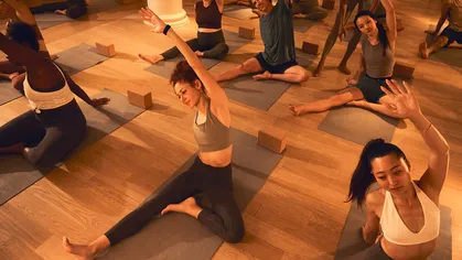 People taking a yoga class.