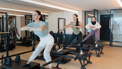 Three women in a Pilates class