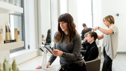 An employee working at a salon
