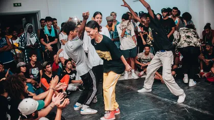 A group of people dancing during a class