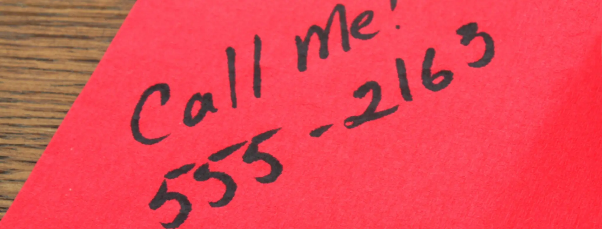 Phone number written on a napkin