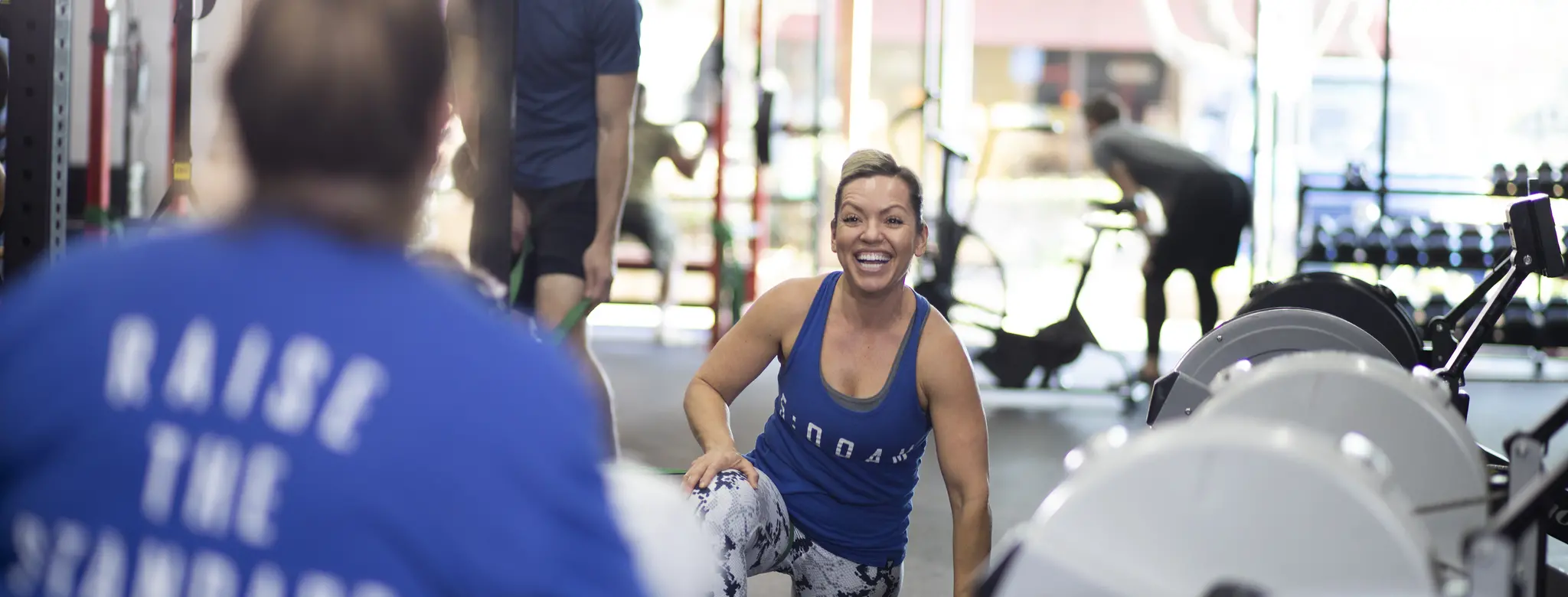 Client smiling in fitness business