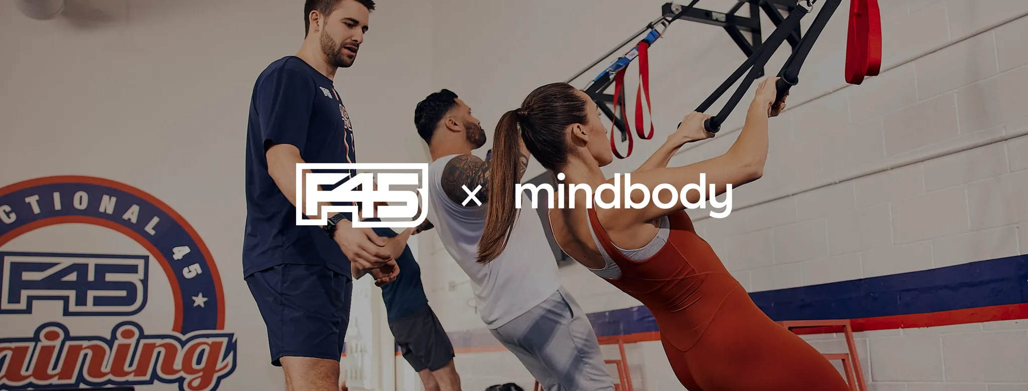 male group fitness instructor at f45 with clients