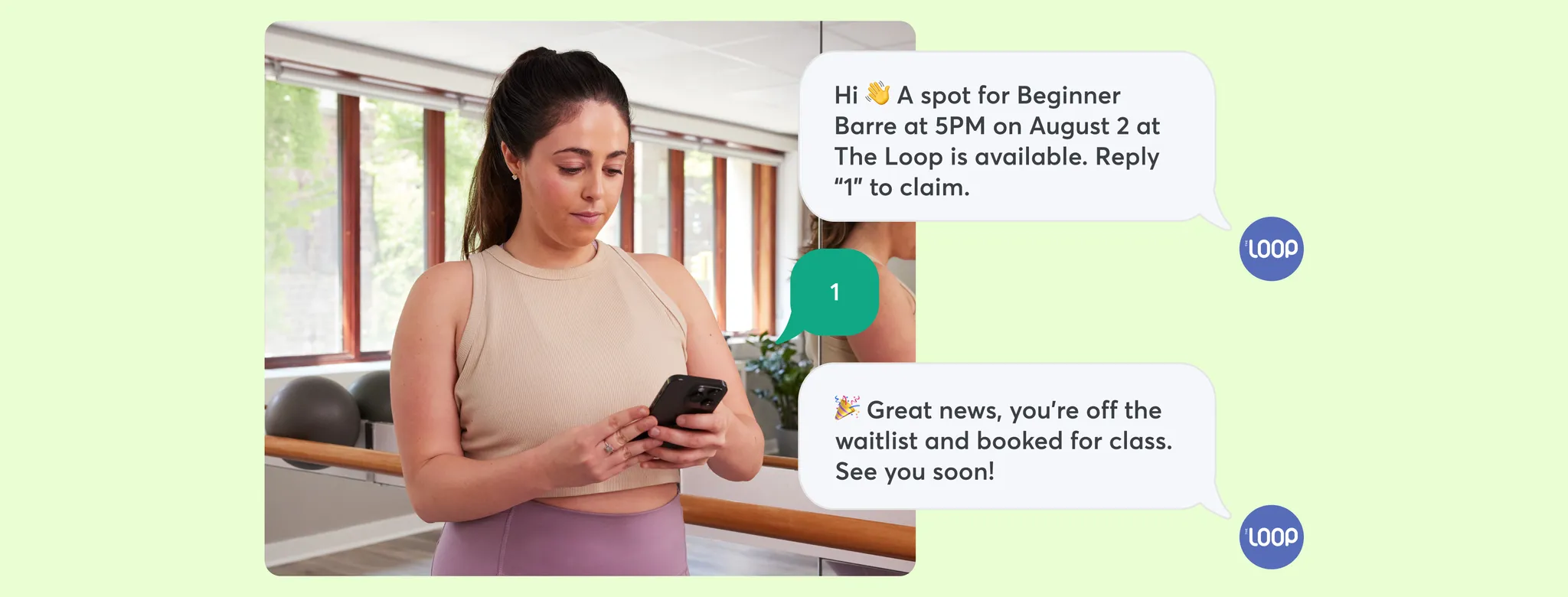 Woman in fitness class looking on phone for waitlist position