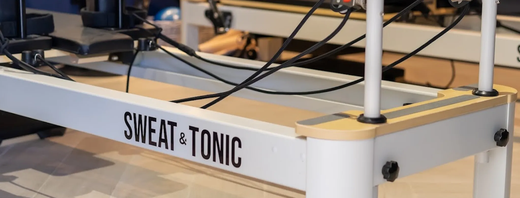 A pilates reformer at sweat & tonic