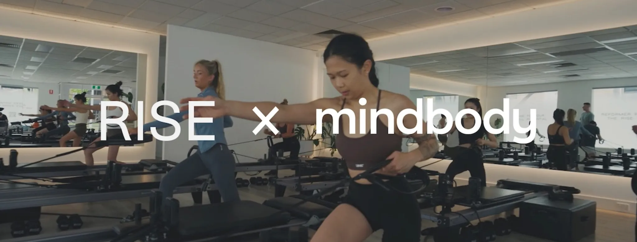 3 women taking a Pilates class