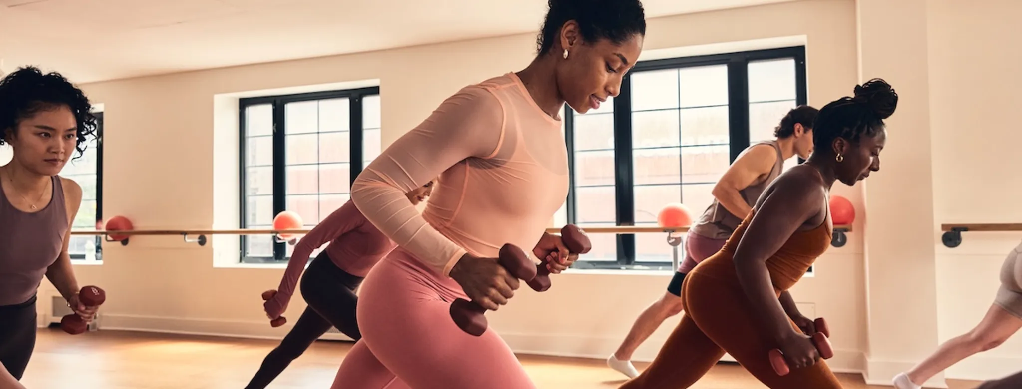 People taking a Barre class