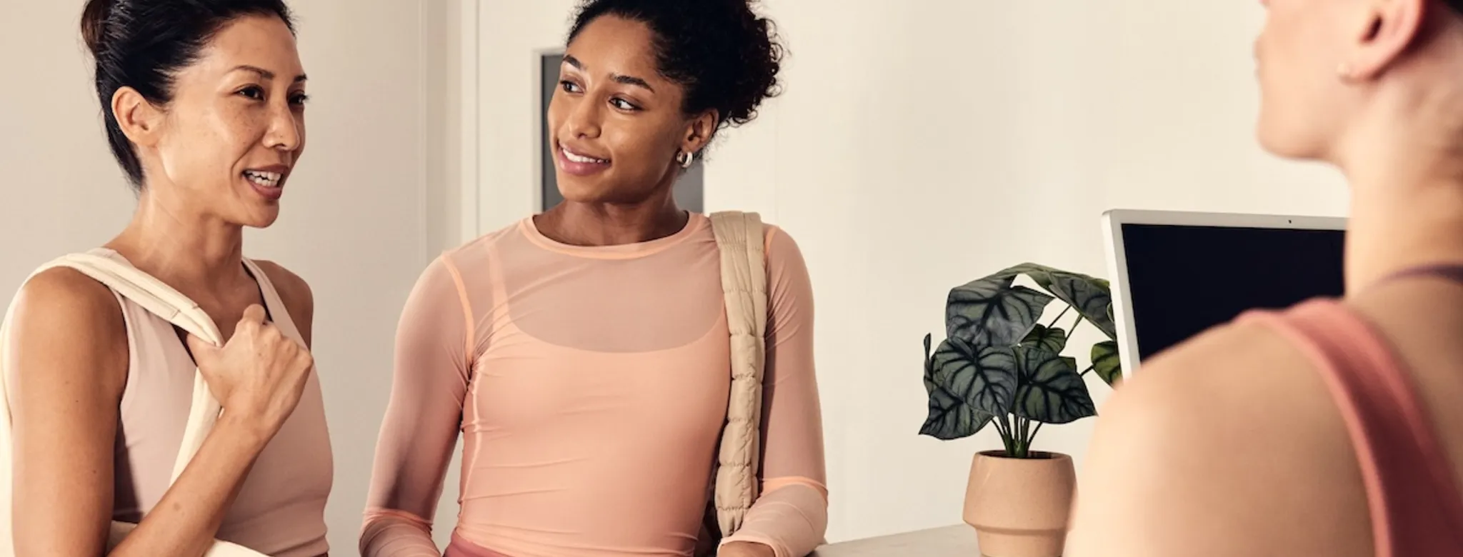 Two clients at the front desk