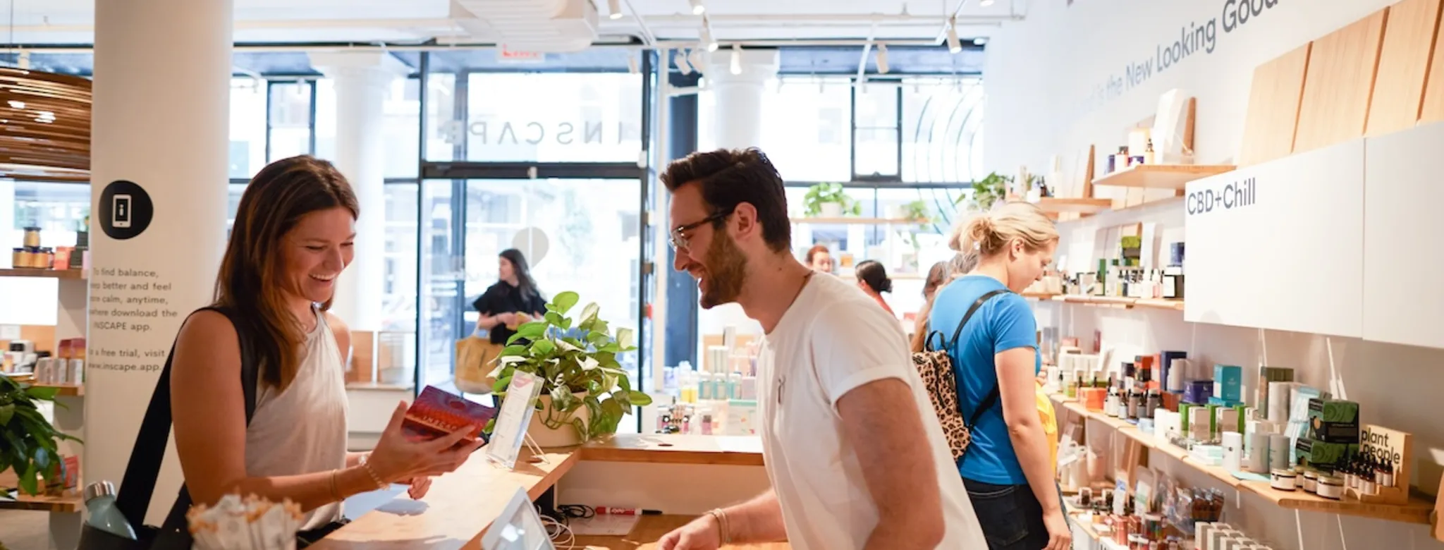 A customer checking out at the front desk 