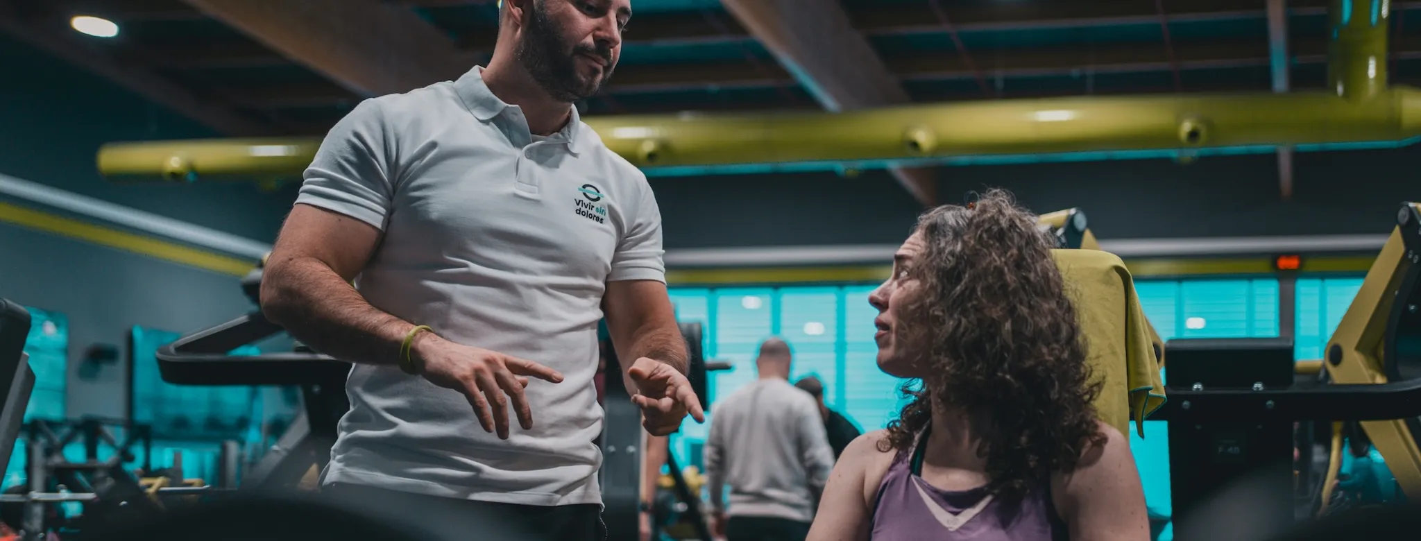 A personal trainer and his client