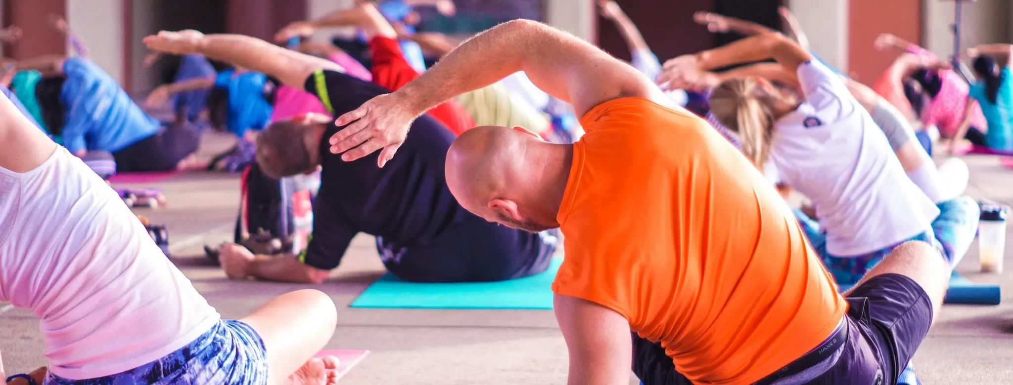 People taking a yoga class.