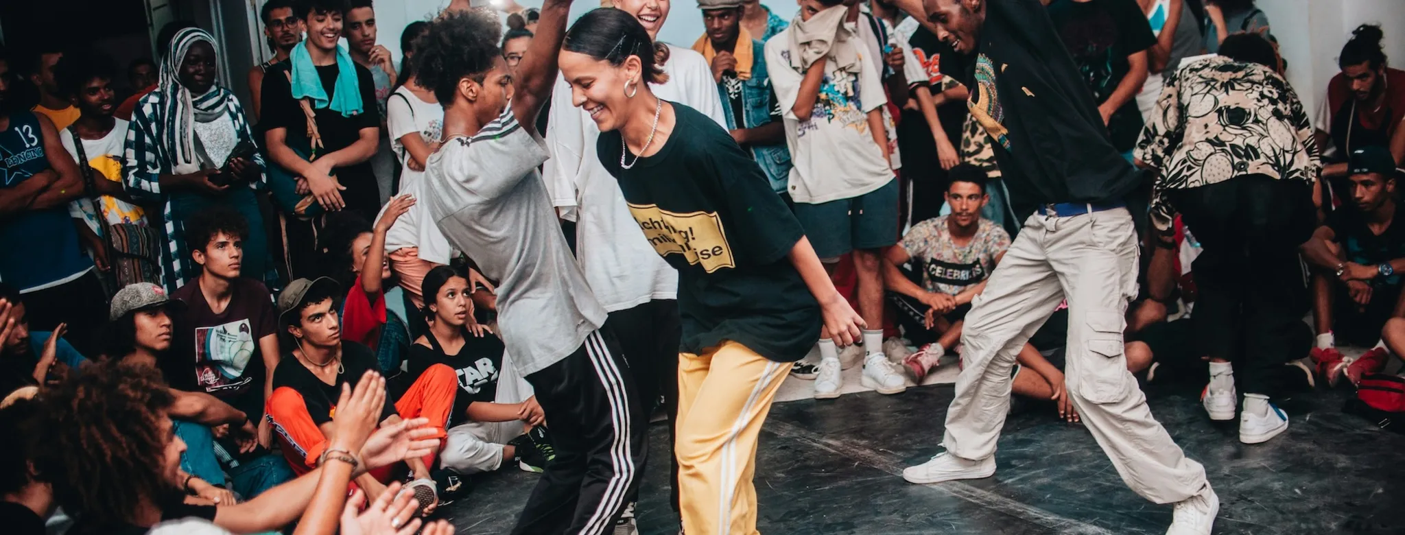 A group of people dancing during a class