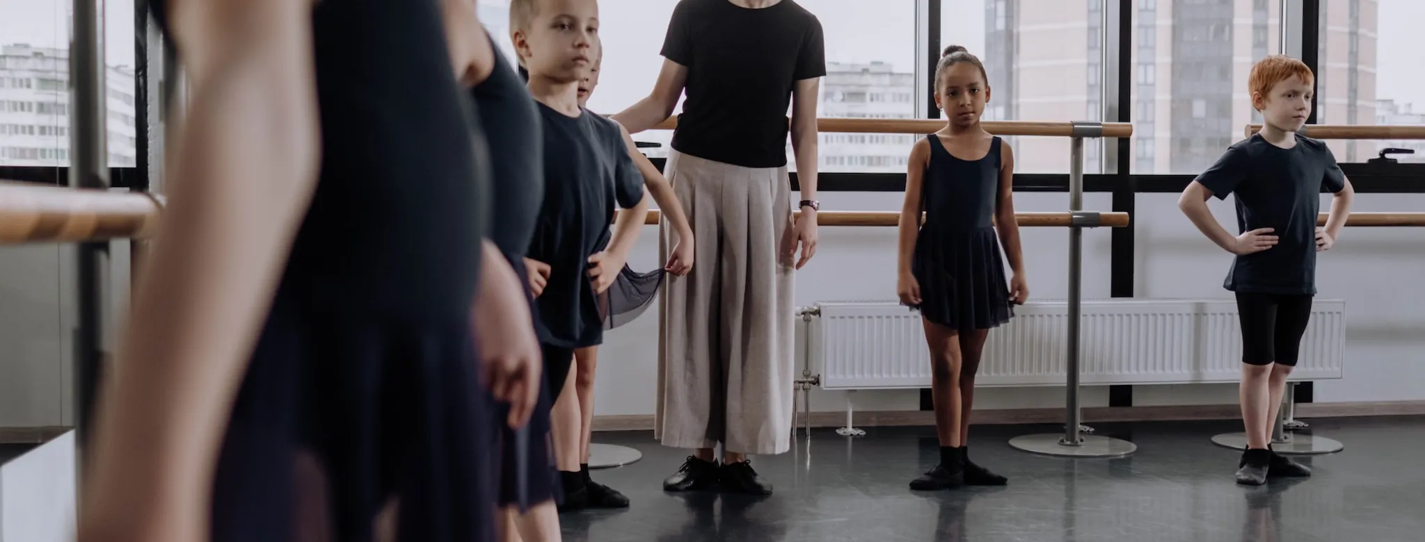 Kids and their instructor in a dance class