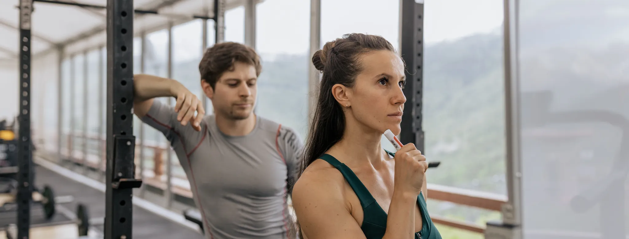 A personal trainer working with a client.