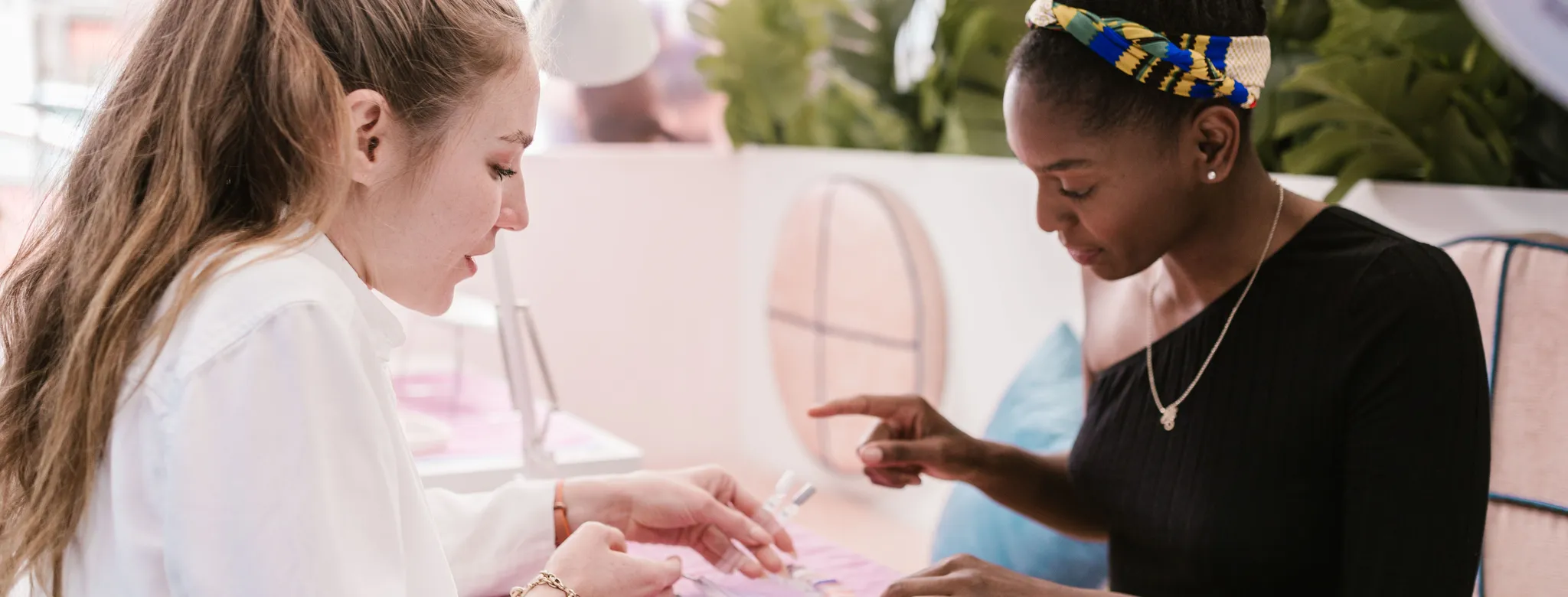 A woman getting her nails done at the nail salon