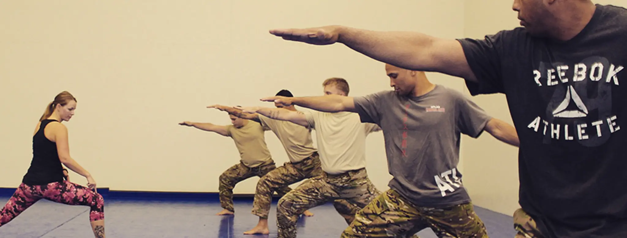 Military members practicing yoga