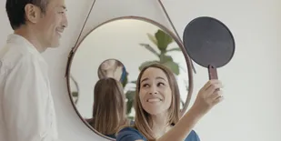 A woman after a hair appointment at Takamichi salon