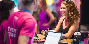 Woman checks into conference