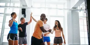 People celebrating during workout