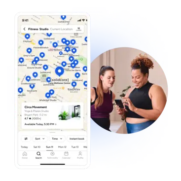 Two women looking at a phone along side a screenshot of the ClassPass app