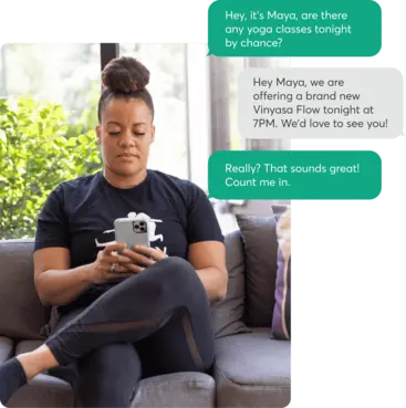 A business owner texts with a client.